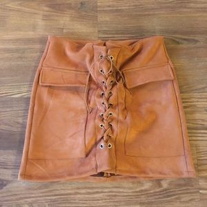 Brown lace up skirt.